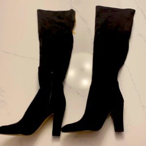 Worn once. Zippers at top and bottom.